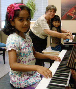 Girls playing piano